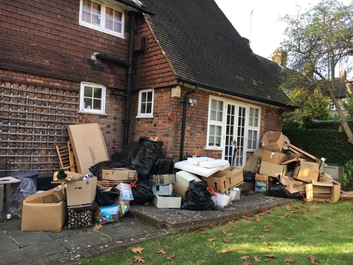 Items stacked outside a house ready for clearance – House & Office Clearance West London
