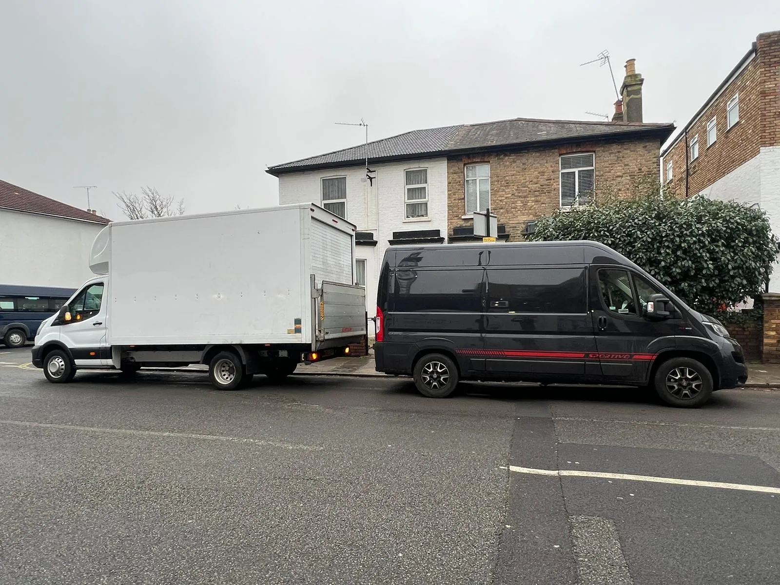 Two MV Movers vans in a street – Falmouth, Cornwall