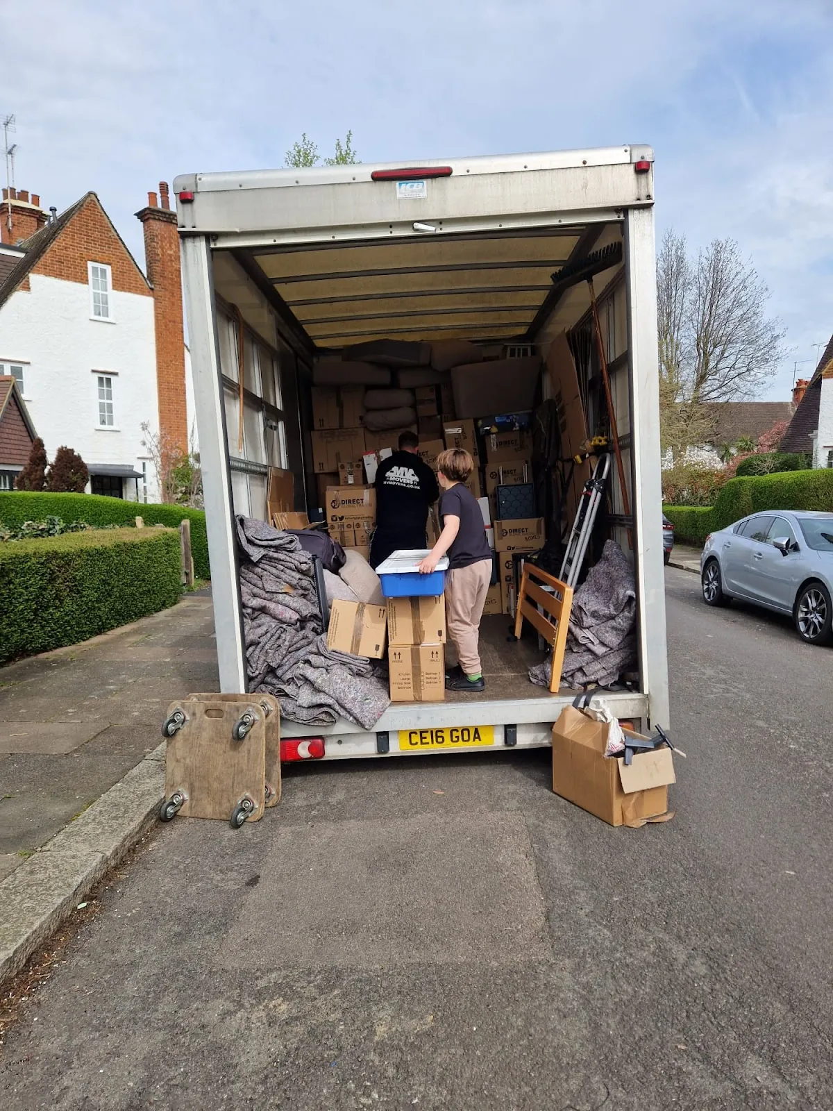 Suburban unload – Ramp down, crew in – MV Movers